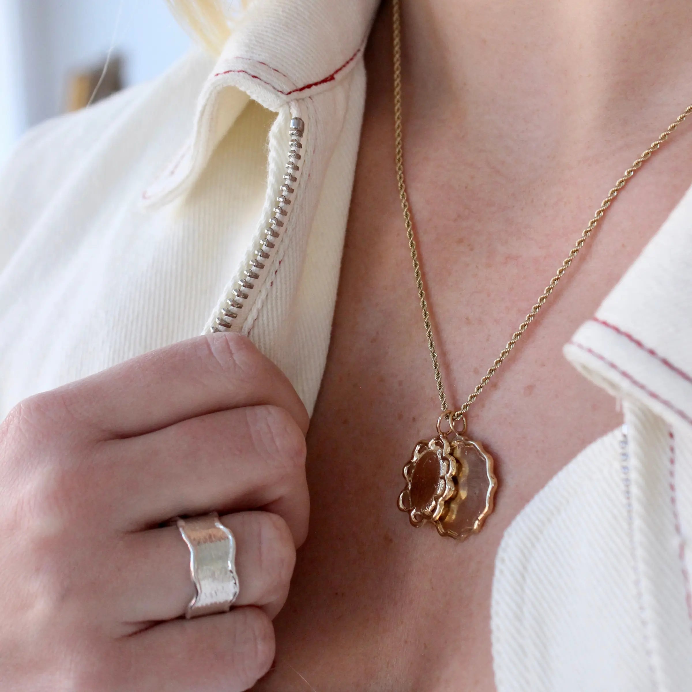 Custom fine jewelry hand-carved in gold and designed as modern heirlooms by Mary Frances Maker.