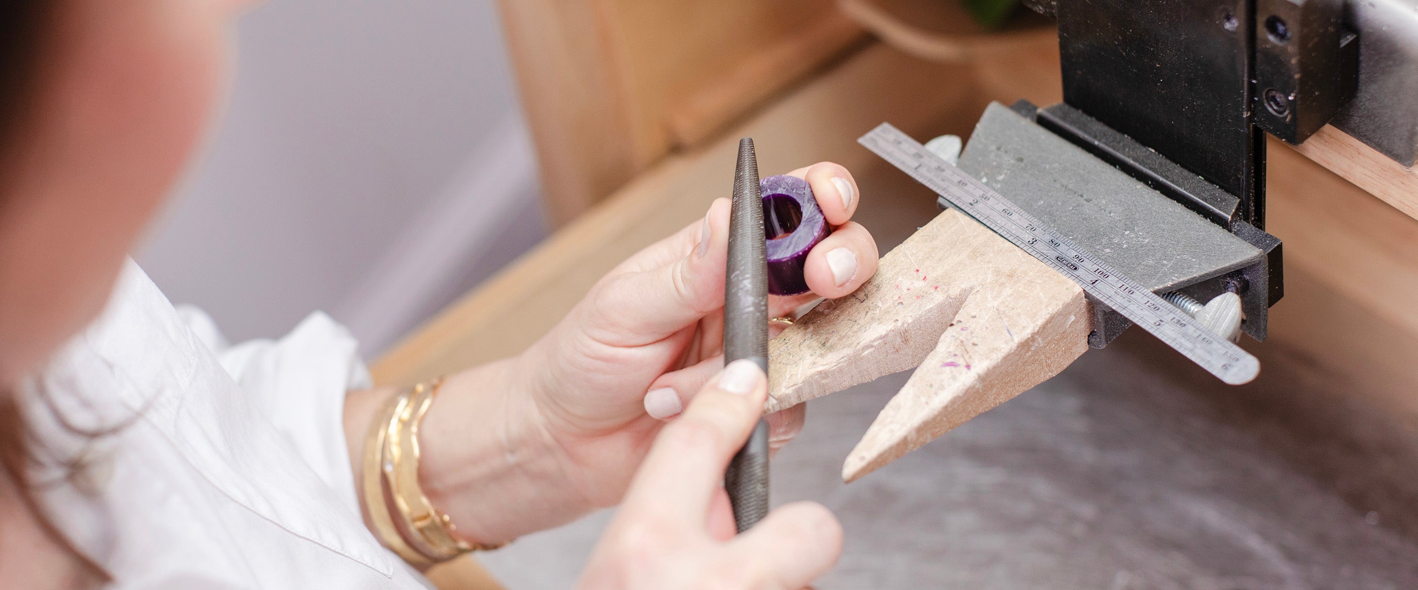 Mary Frances Maker carving a wax model for a custom fine jewelry commission in her Atlanta studio